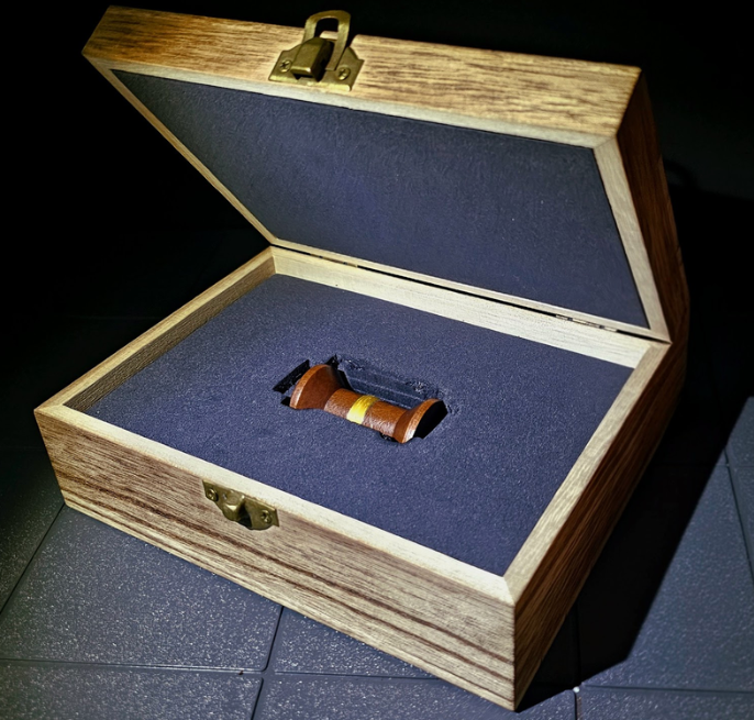 Natural golden spider silk presented in a bespoke case